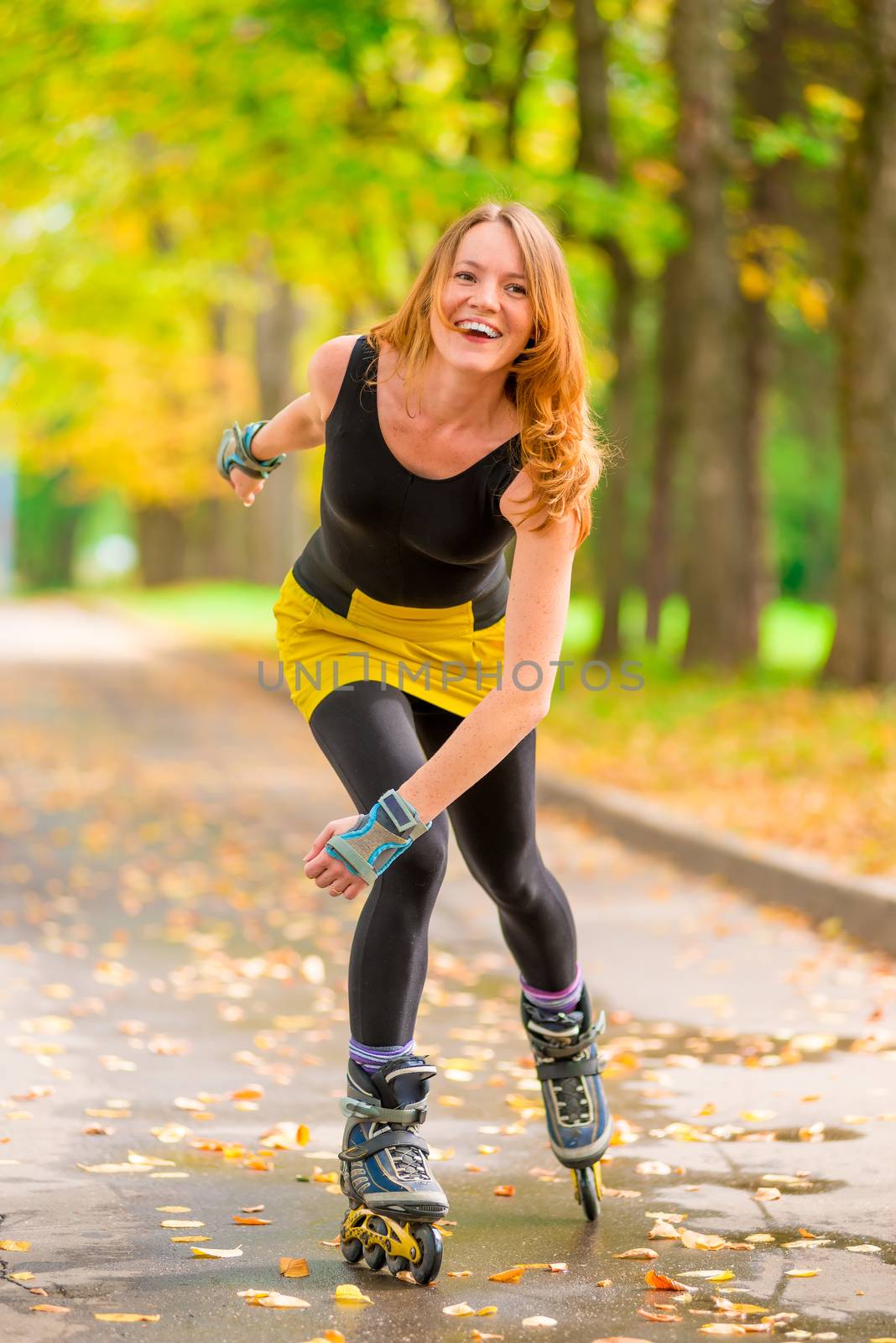 laughing girl roller-skating in the autumn park one by kosmsos111