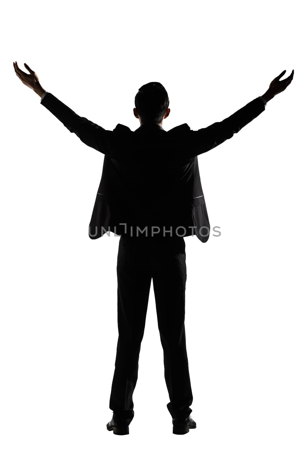 Silhouette of Asian businessman open arms feel free, rear view, full length portrait isolated on white background.