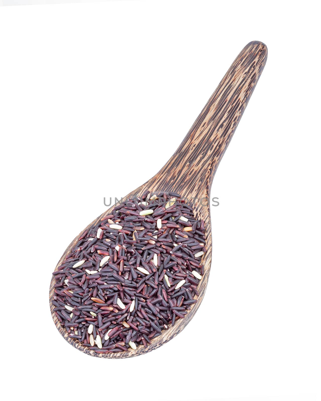 Organic Riceberry Rice (black jasmine rice) on wooden ladle isolated on white