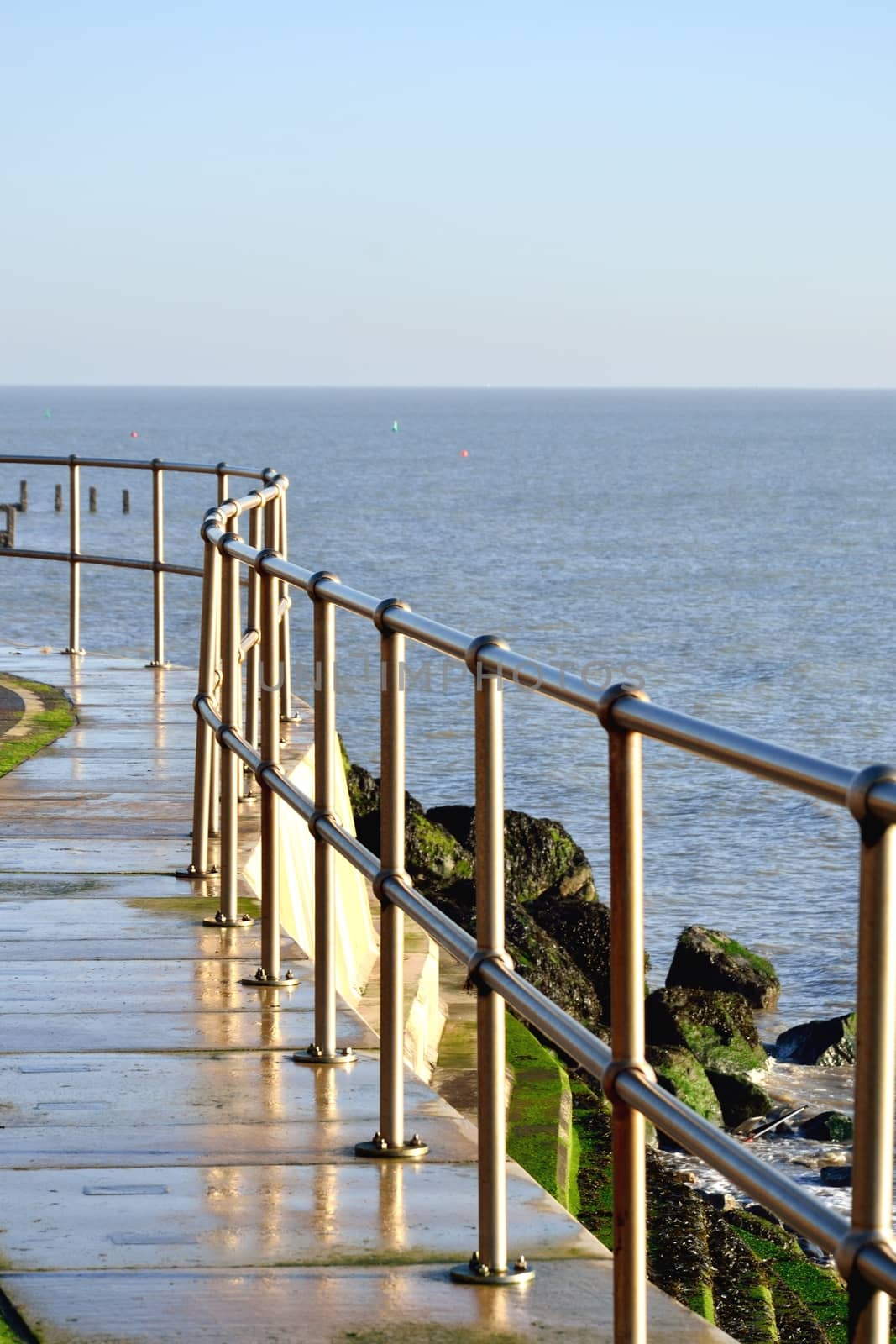 Metal fence on coast by pauws99