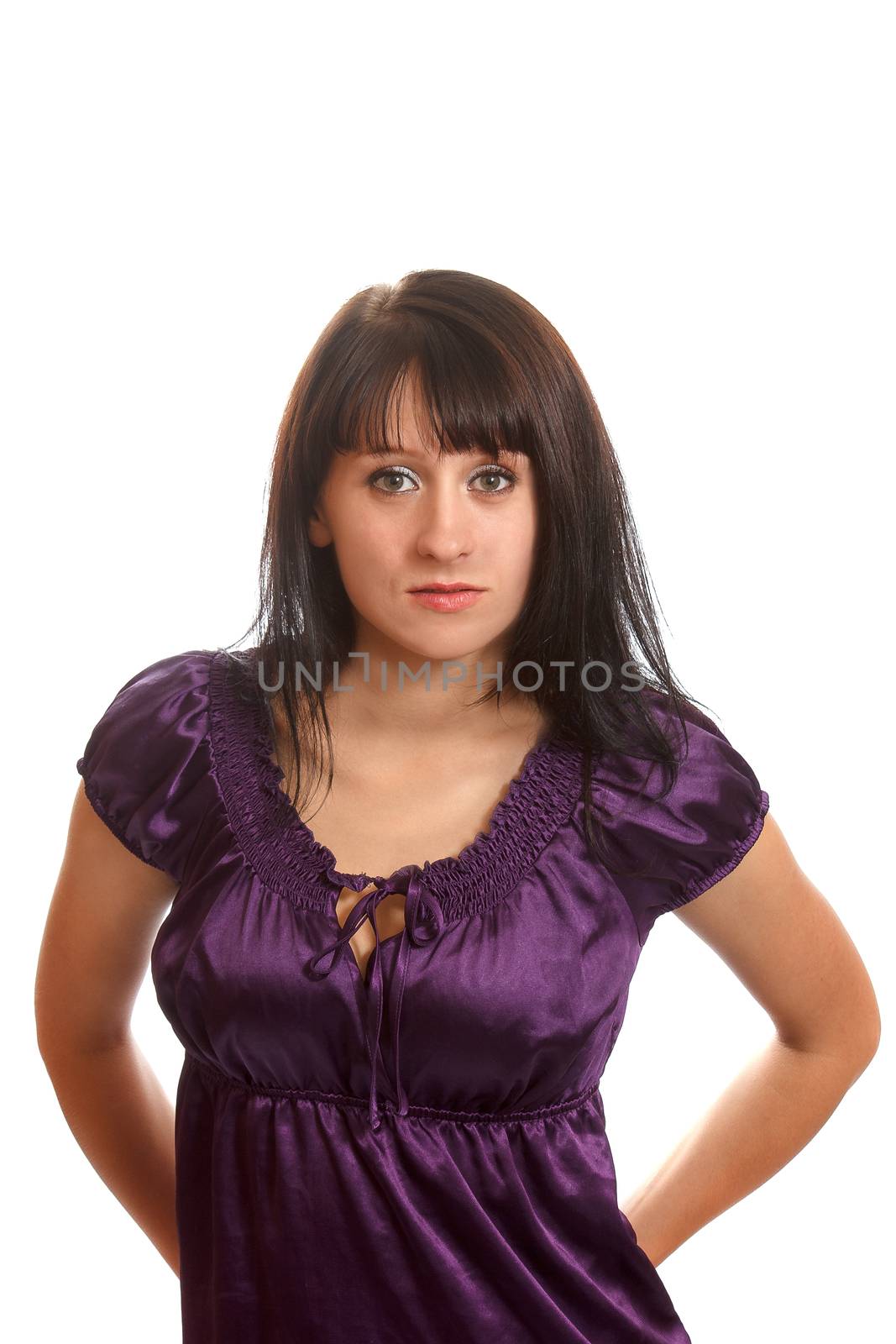 An brown haired female adult wearing a purple dress