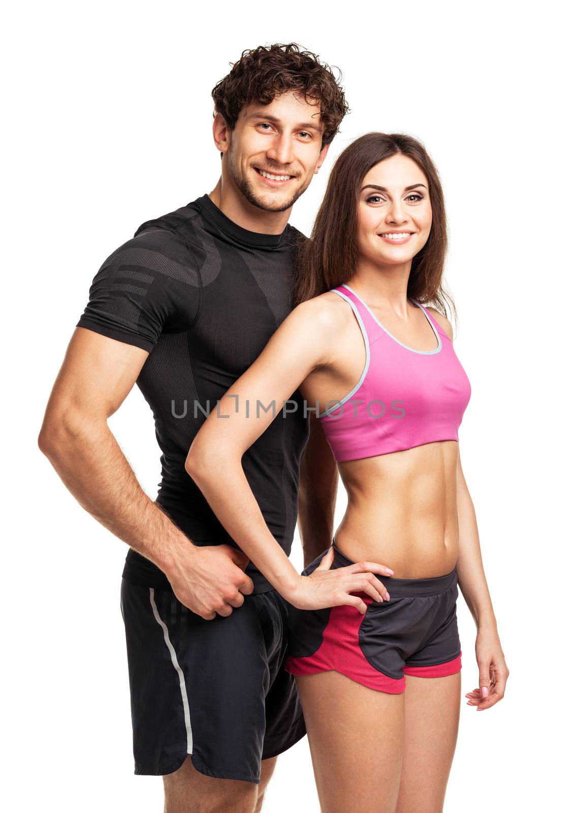 Athletic man and woman after fitness exercise on the white background