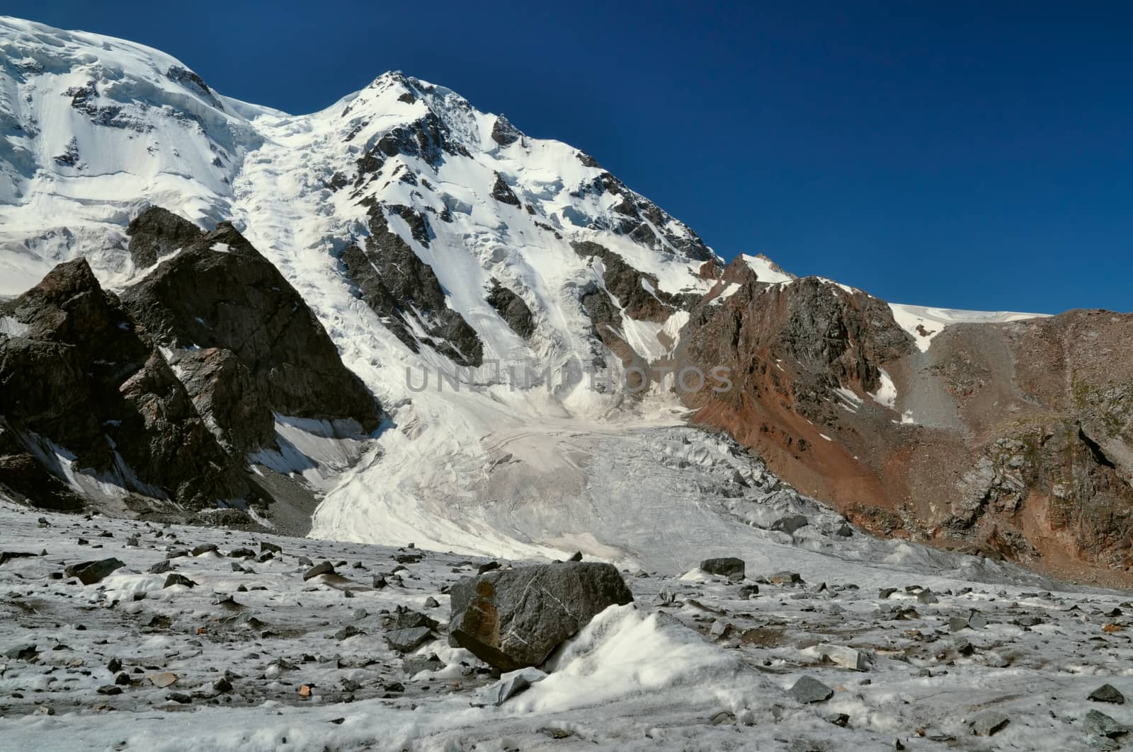 Scenic view of glacier and highest peaks in Tien-Shan mountain range in Kyrgyzstan