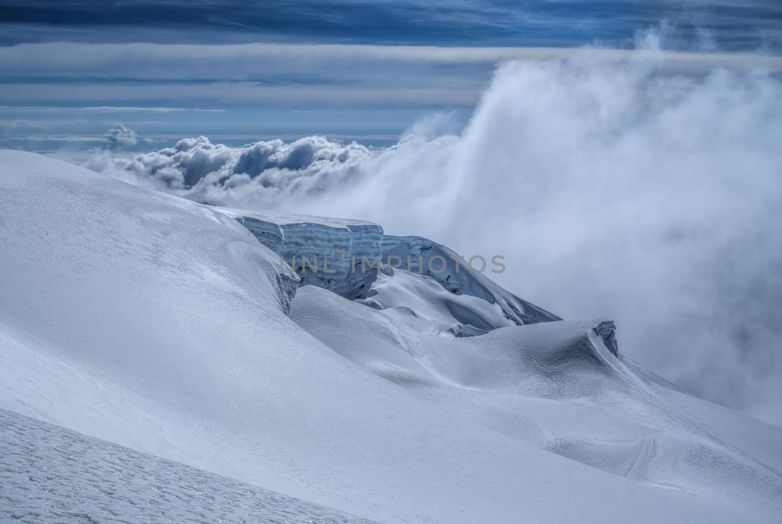 Dramatic clouds gathering in high altitude near top of Huayna Potosi mountain in Bolivia