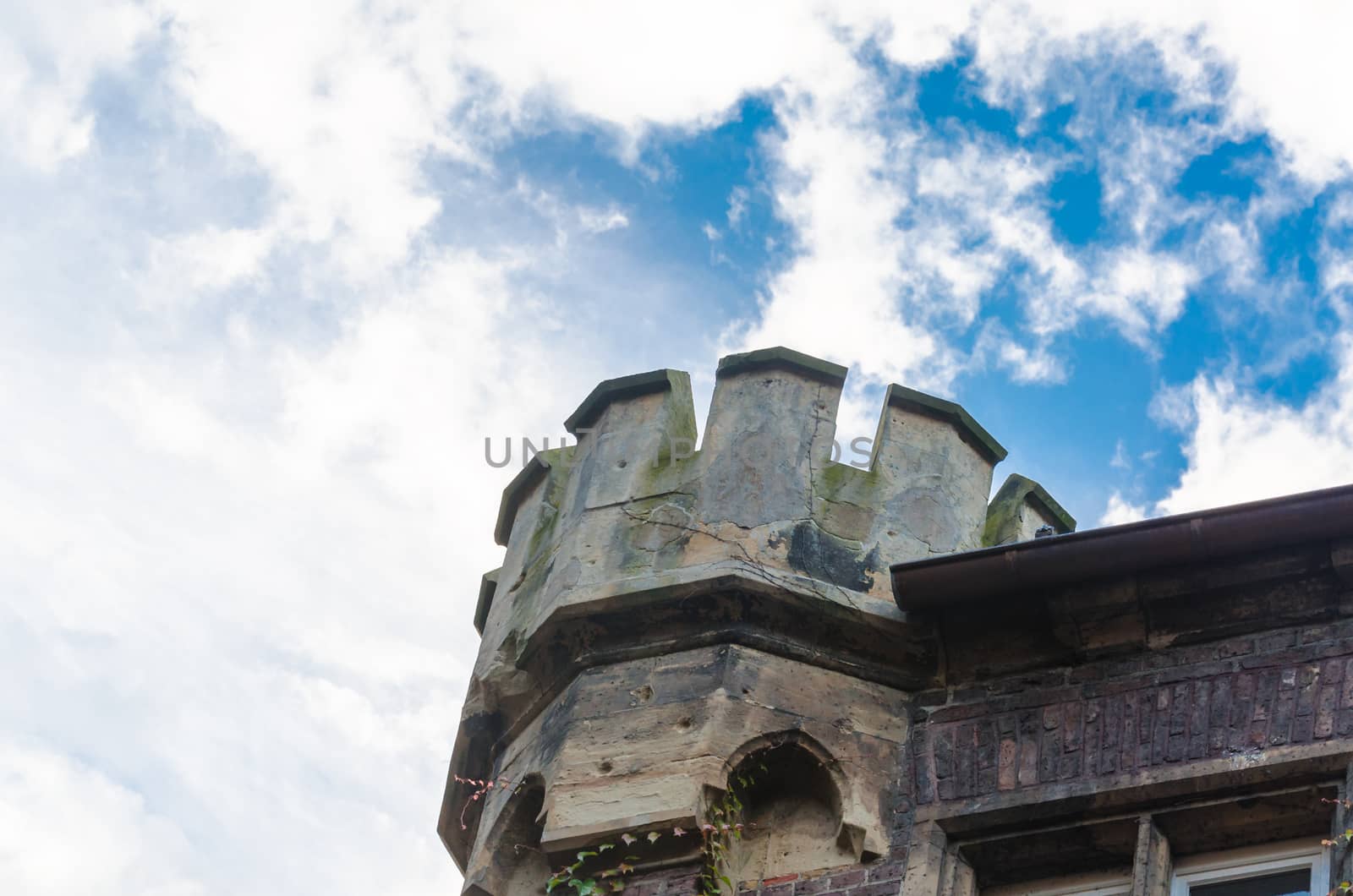 Castle tower against a beautiful blue sky.