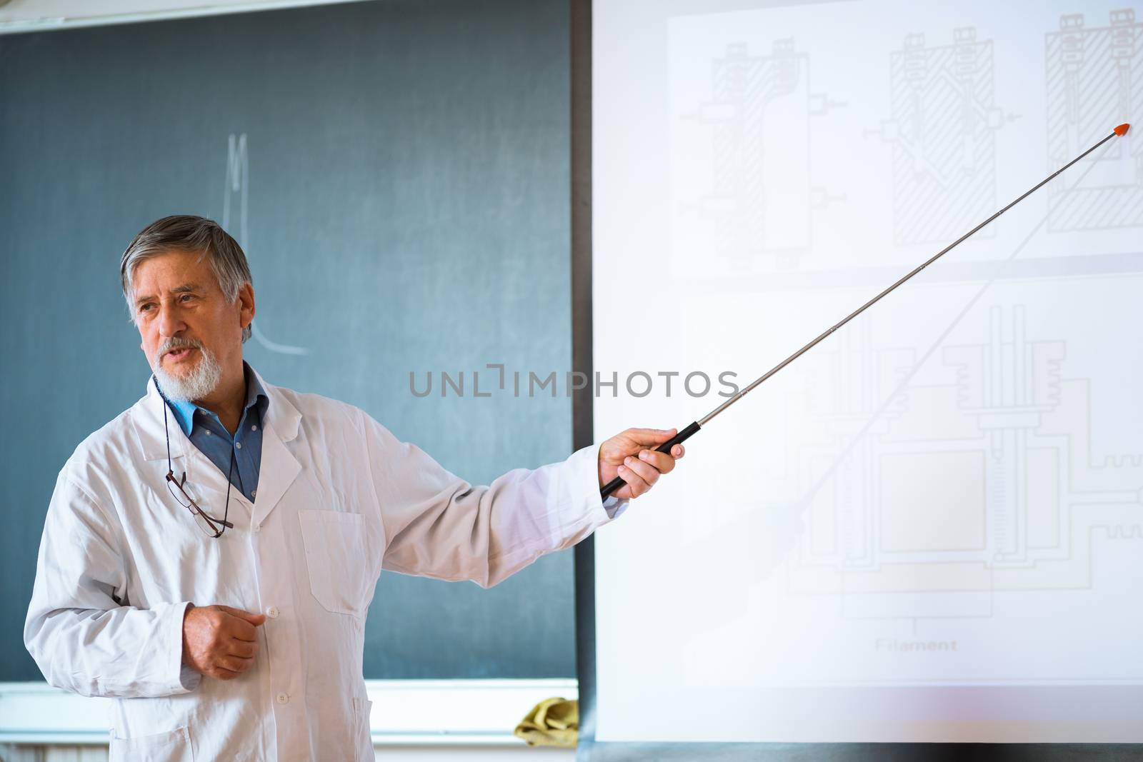 Senior chemistry professor giving a lecture by viktor_cap