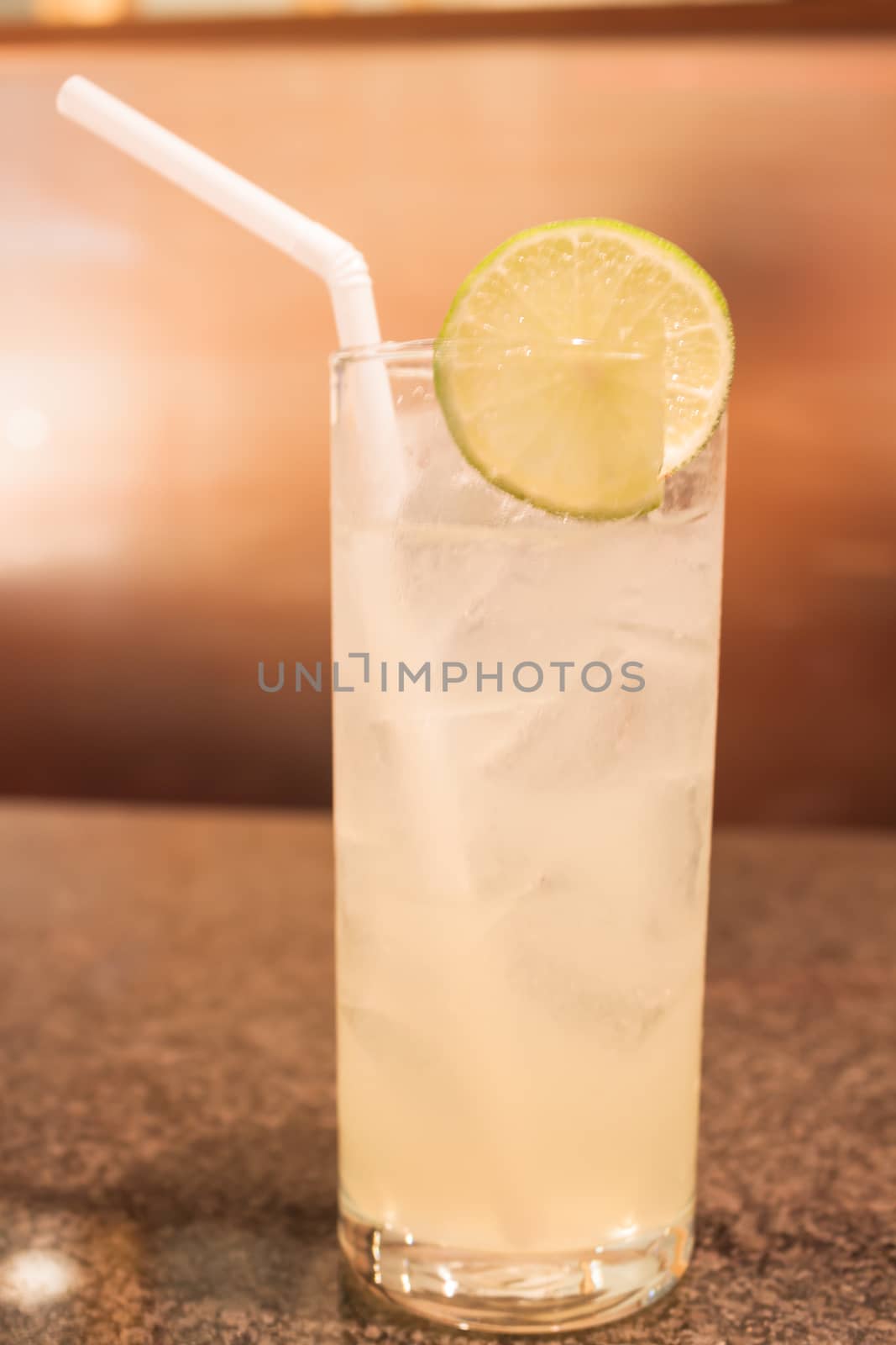 Glass of ice lemon juice by punsayaporn