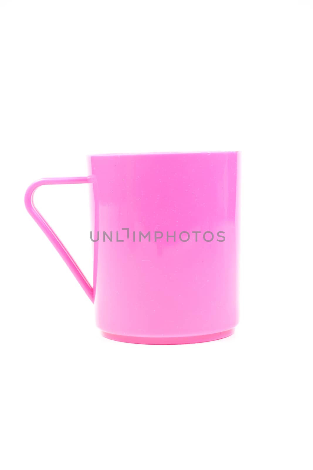 Pink plastic glass. Outstanding white background.catch and take, the background is white.