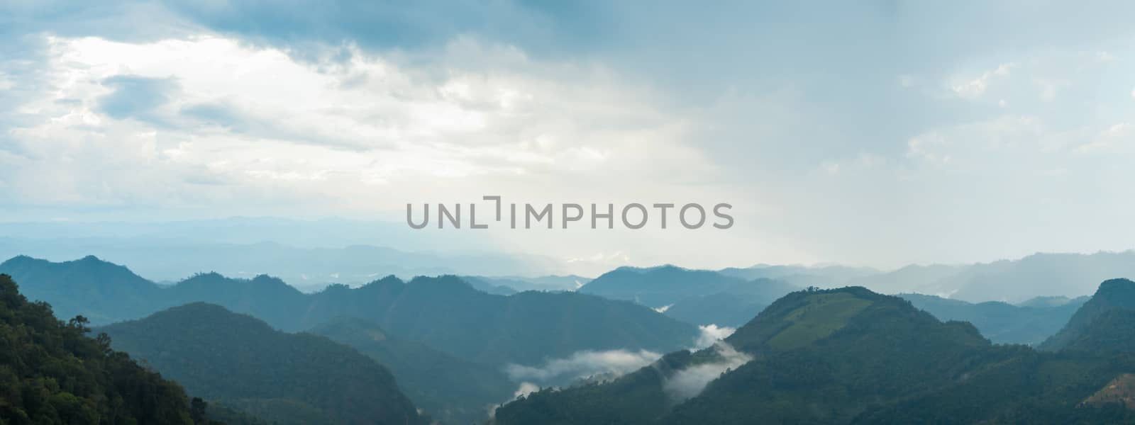 Panorama high mountains covered with fog. by a454