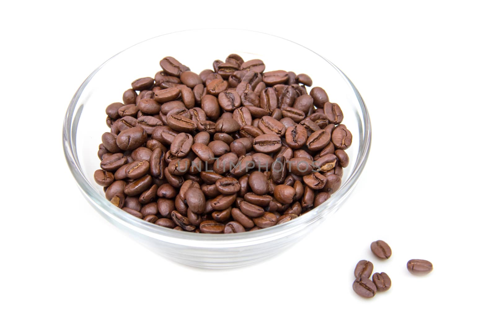 Coffee beans on bowl on white background