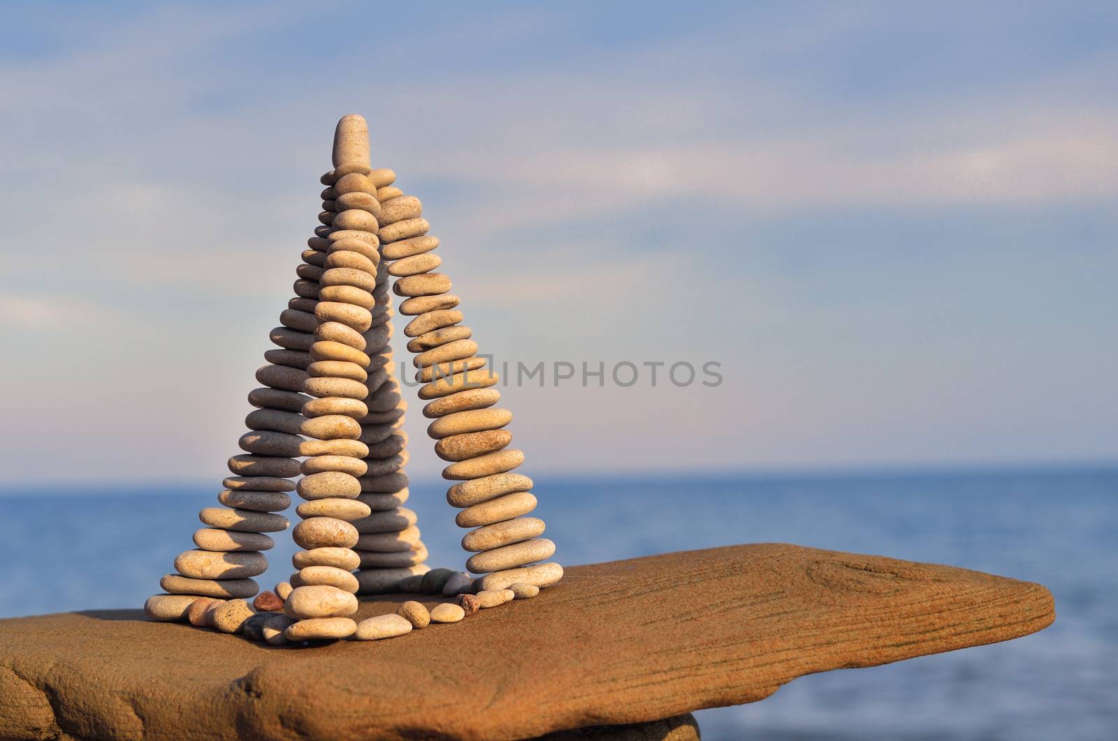 Stones laid out in the form of a pyramid on the seashore