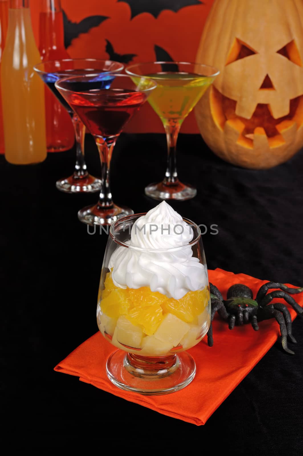 Dessert with slices of pineapple and orange whipped cream