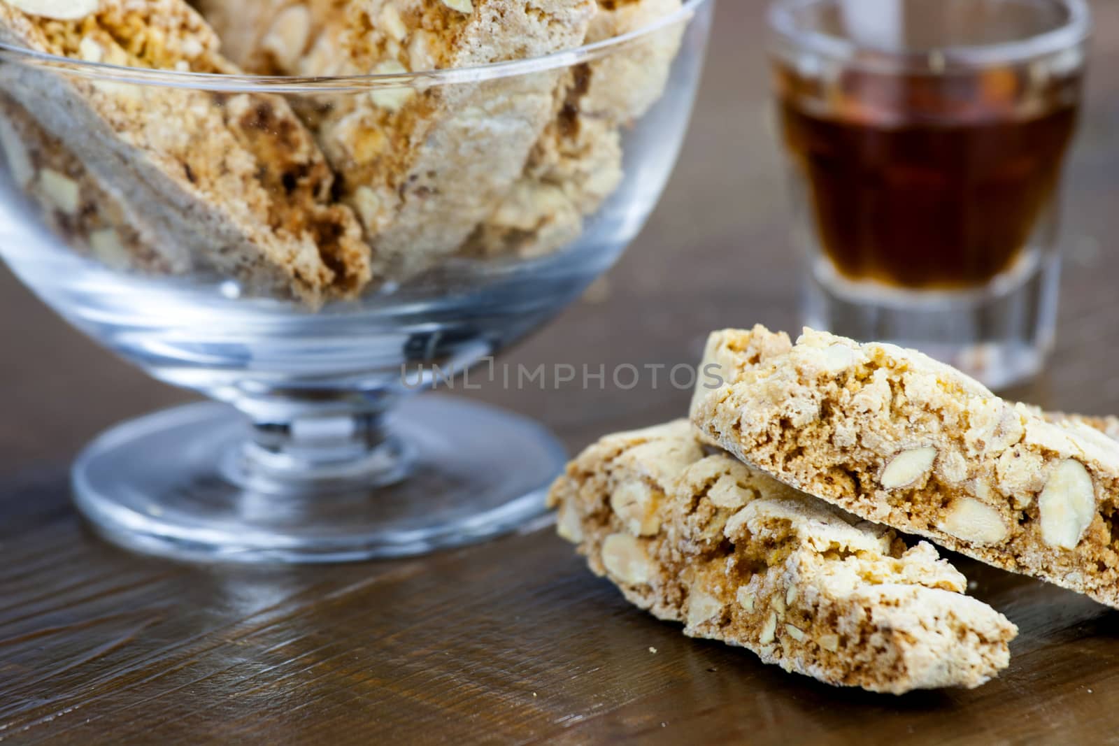 Cantucci, a tipical tuscan biscuits on a wooden table