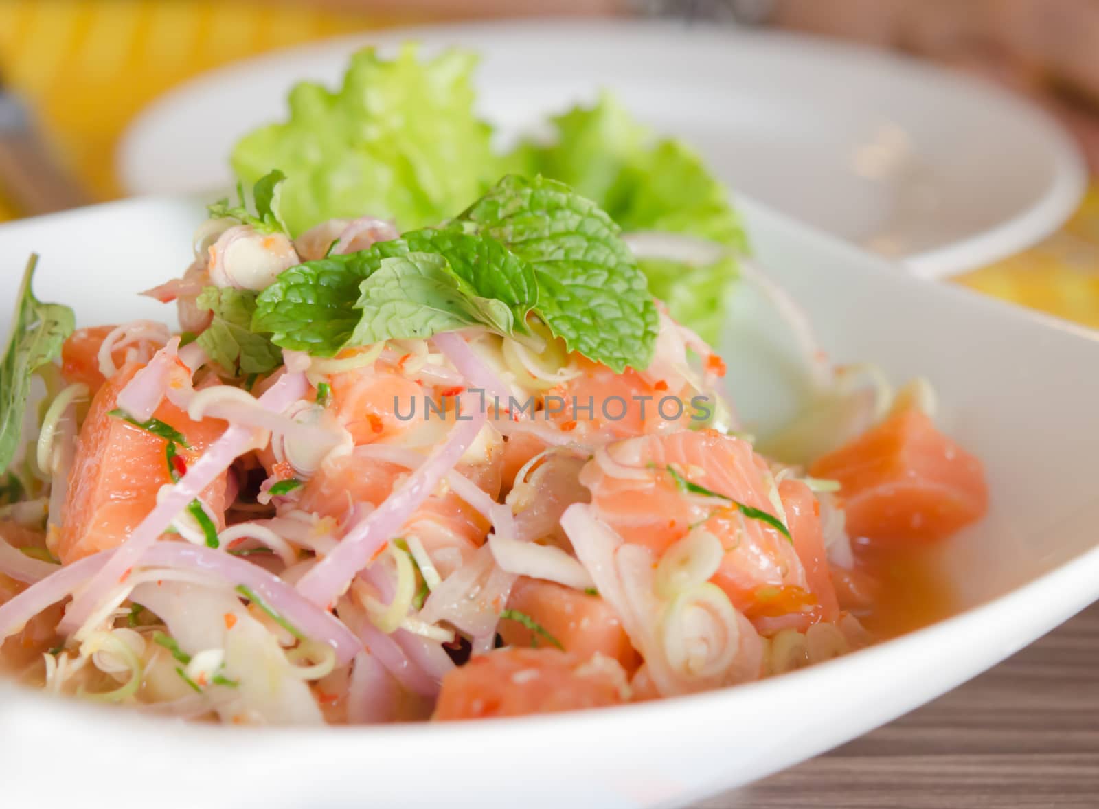 close up of spicy salmon salad with  mixed  vegetable