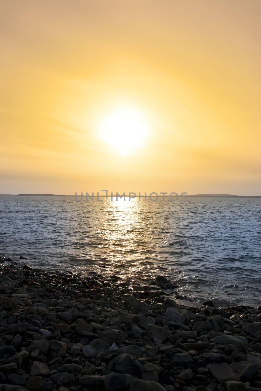 rocky sunset beach at Beal by morrbyte