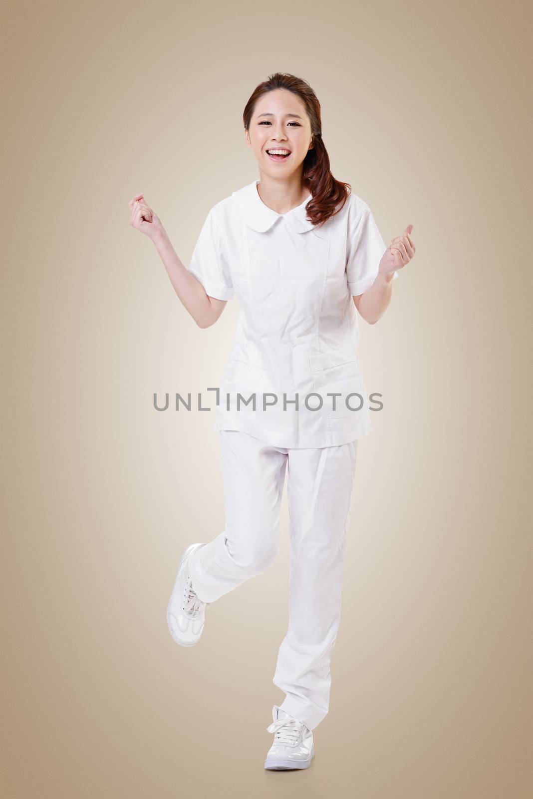 Cheerful Asian nurse, woman portrait isolated on white background.