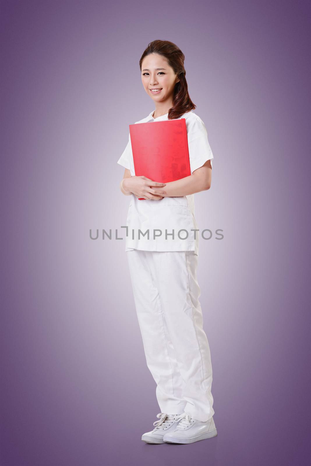 Attractive Asian nurse, woman portrait.Full length.
