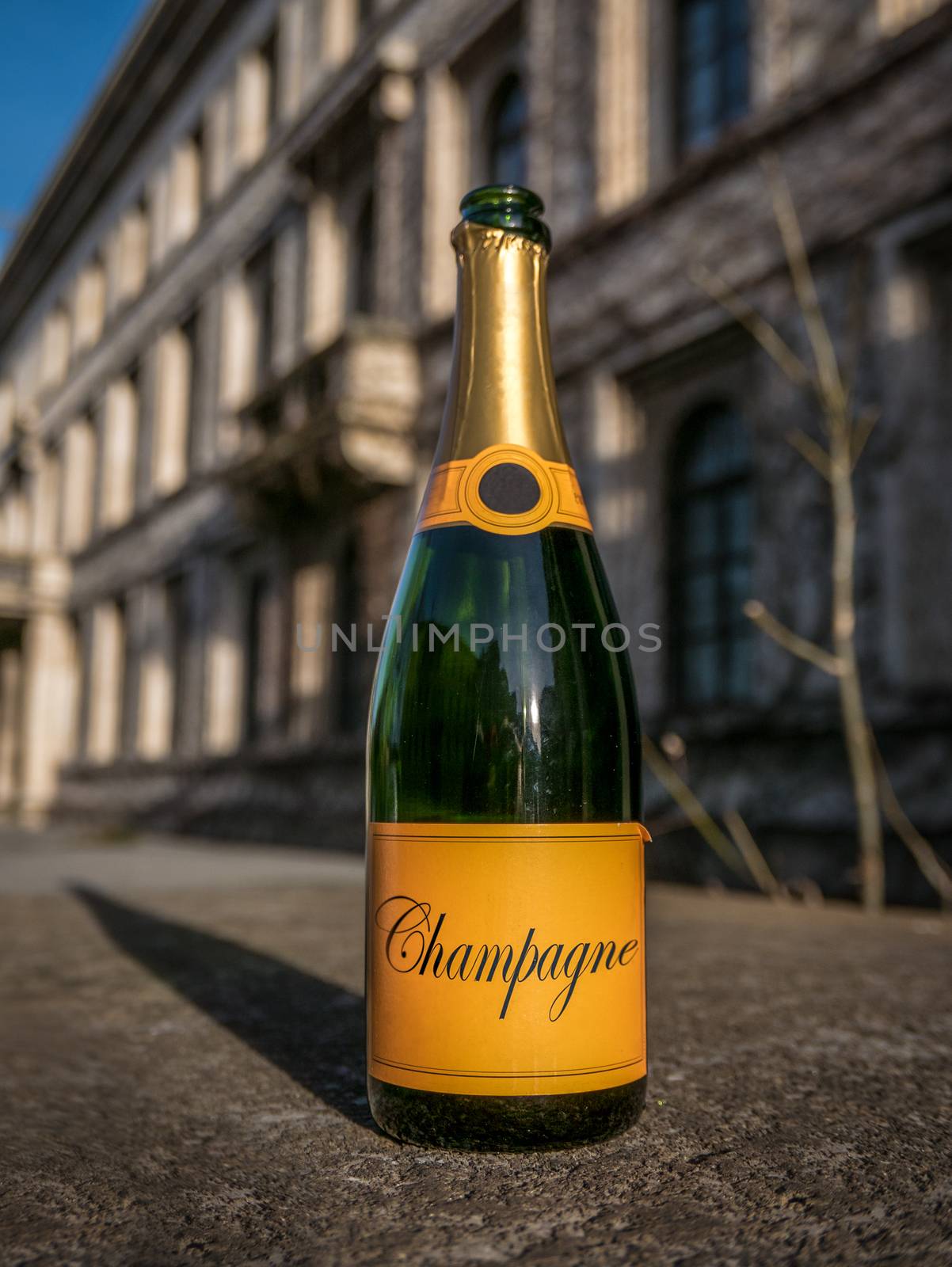 An Empty Bottle Of Champayne In The Street The Morning After A New Year's Party