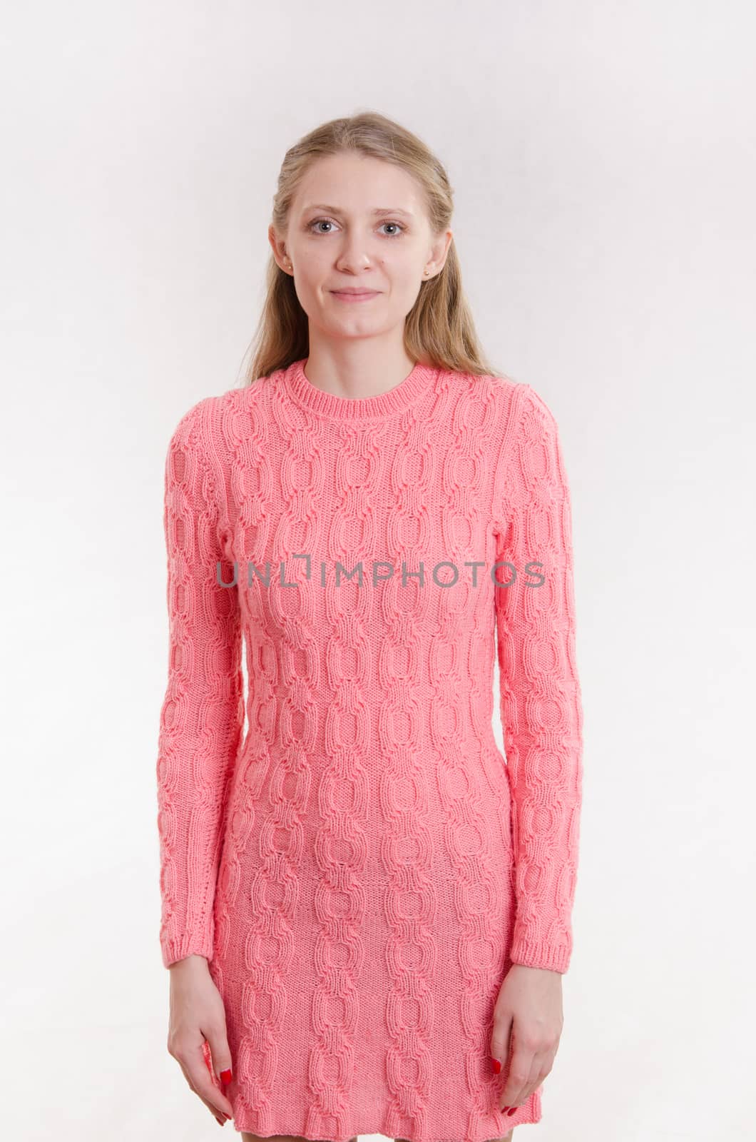 Portrait of a young emotional beautiful girl of the European appearance on a white background