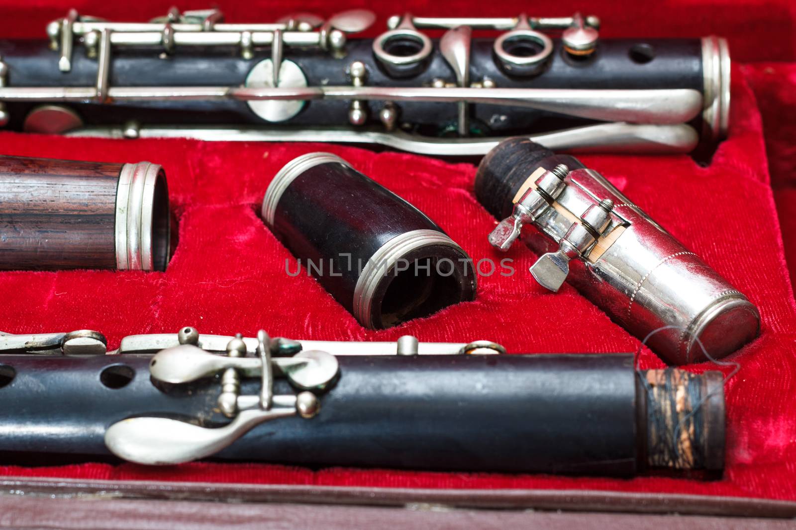 clarinet, wind instrument, disassembled and placed in the case