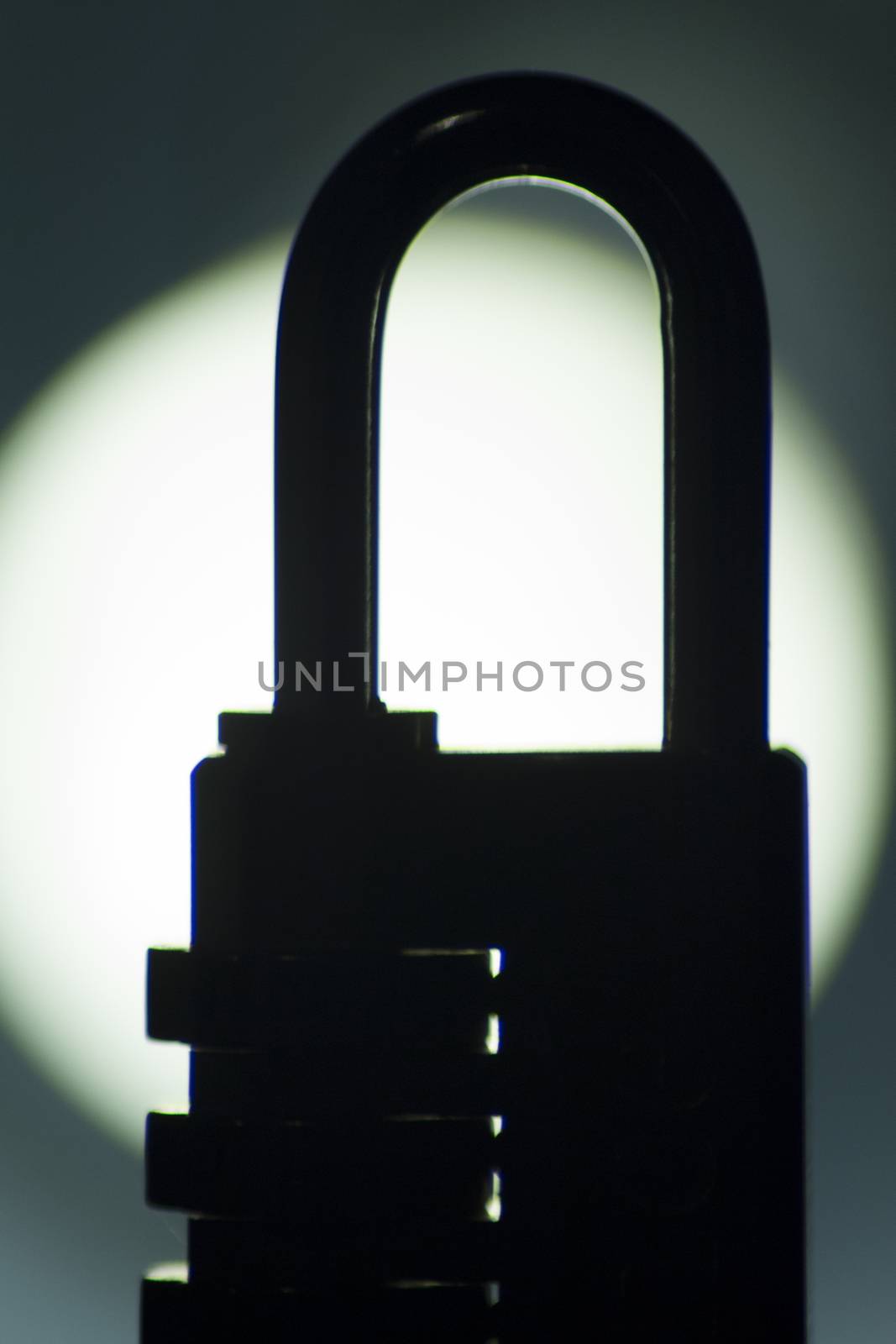 Combination  code padlock silhouette photo.