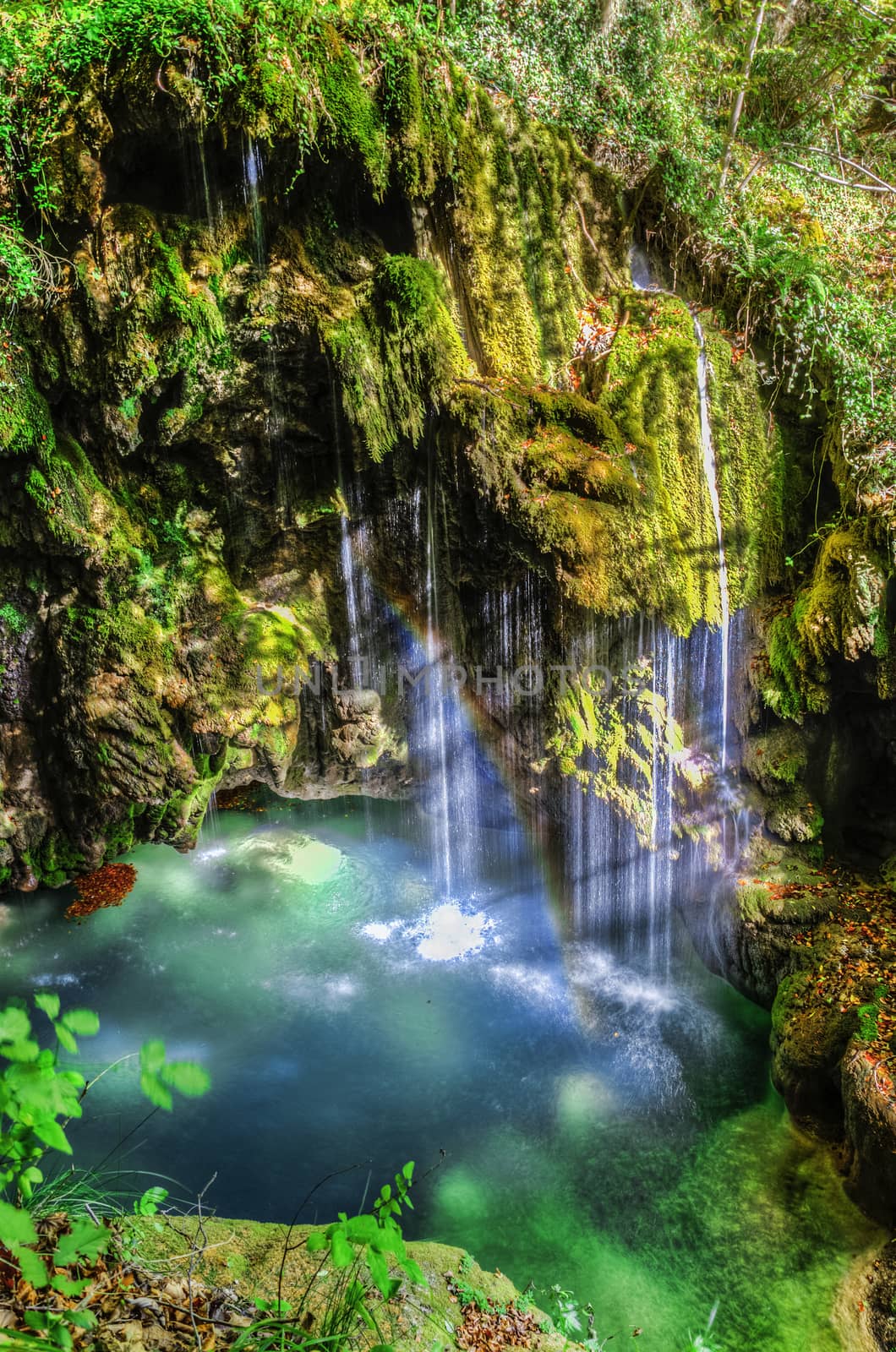 Beautiful waterfall deep into the forest.