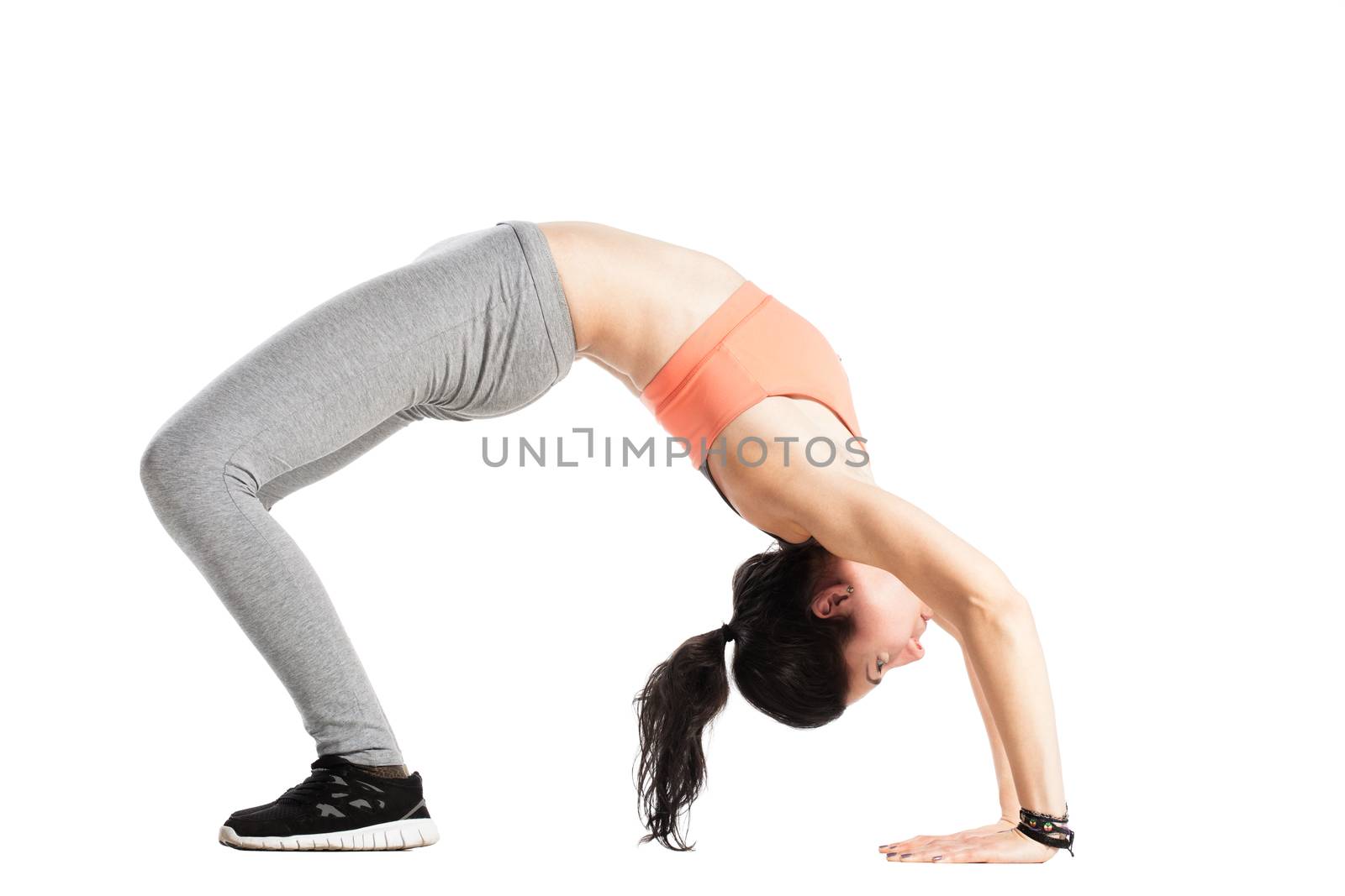 fitness girl posing against white background