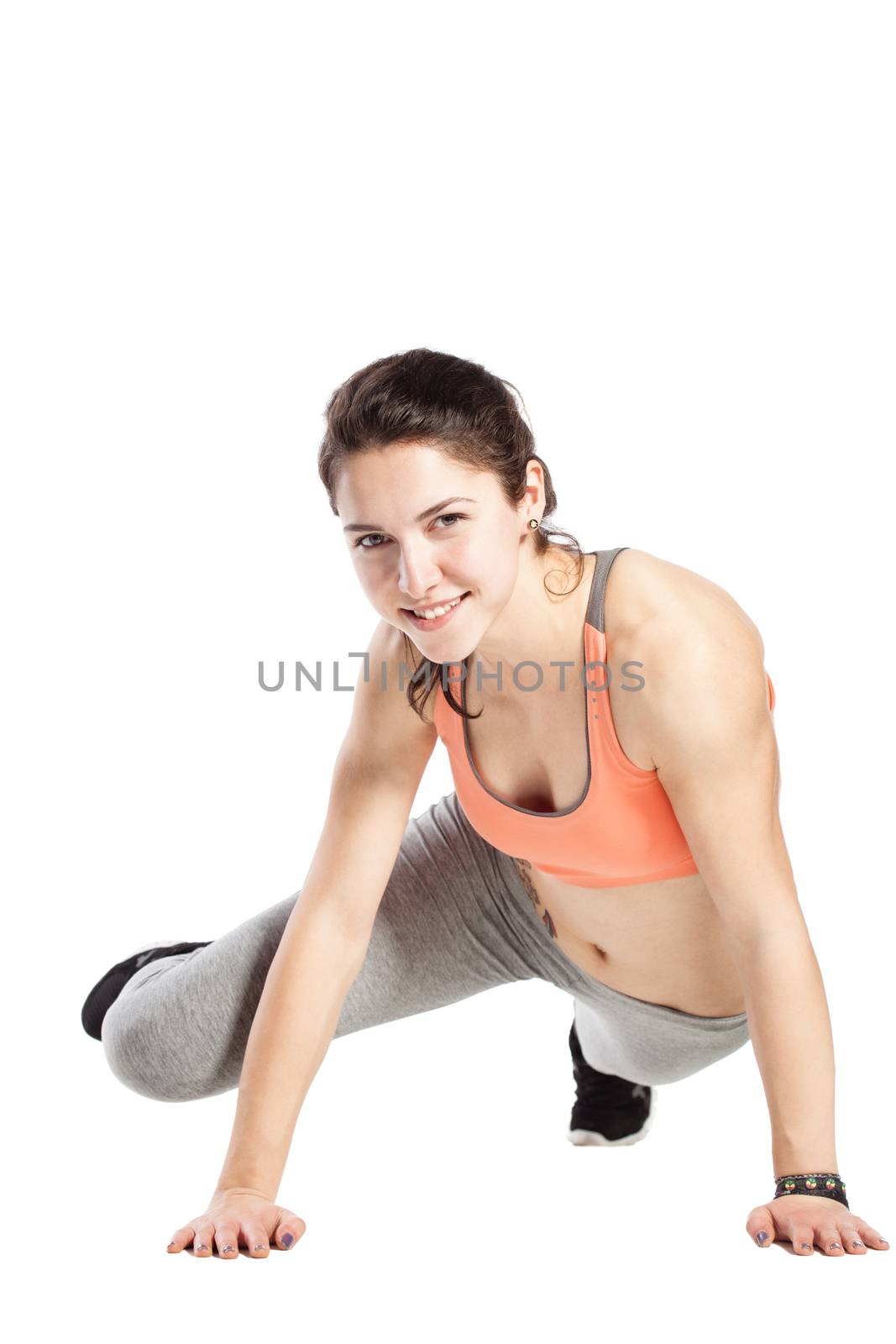 fitness girl posing against white background