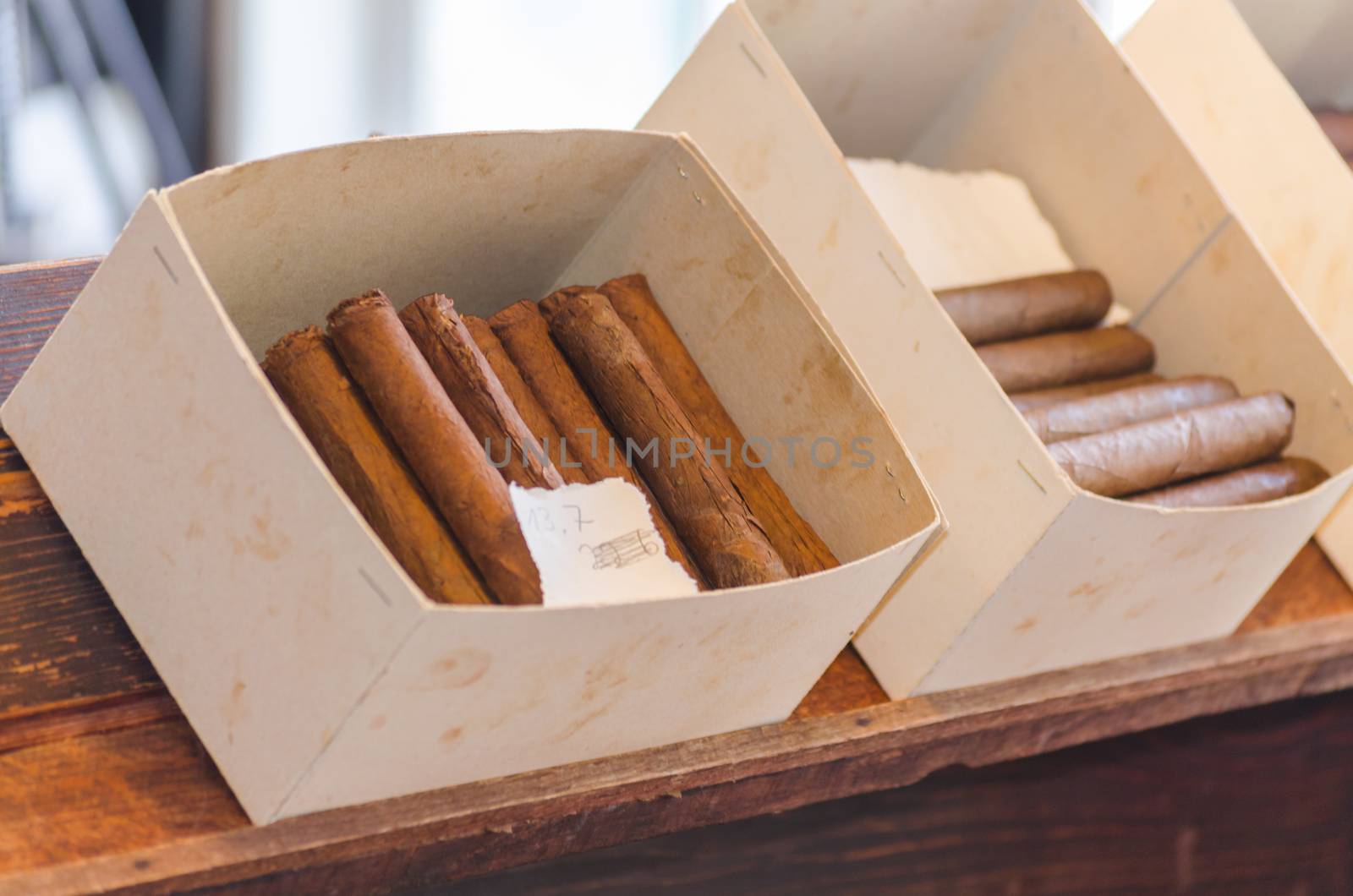 A box full of home-made cigars.