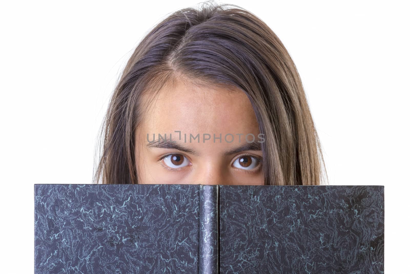 closeup portrait of cute brunette with book on white background