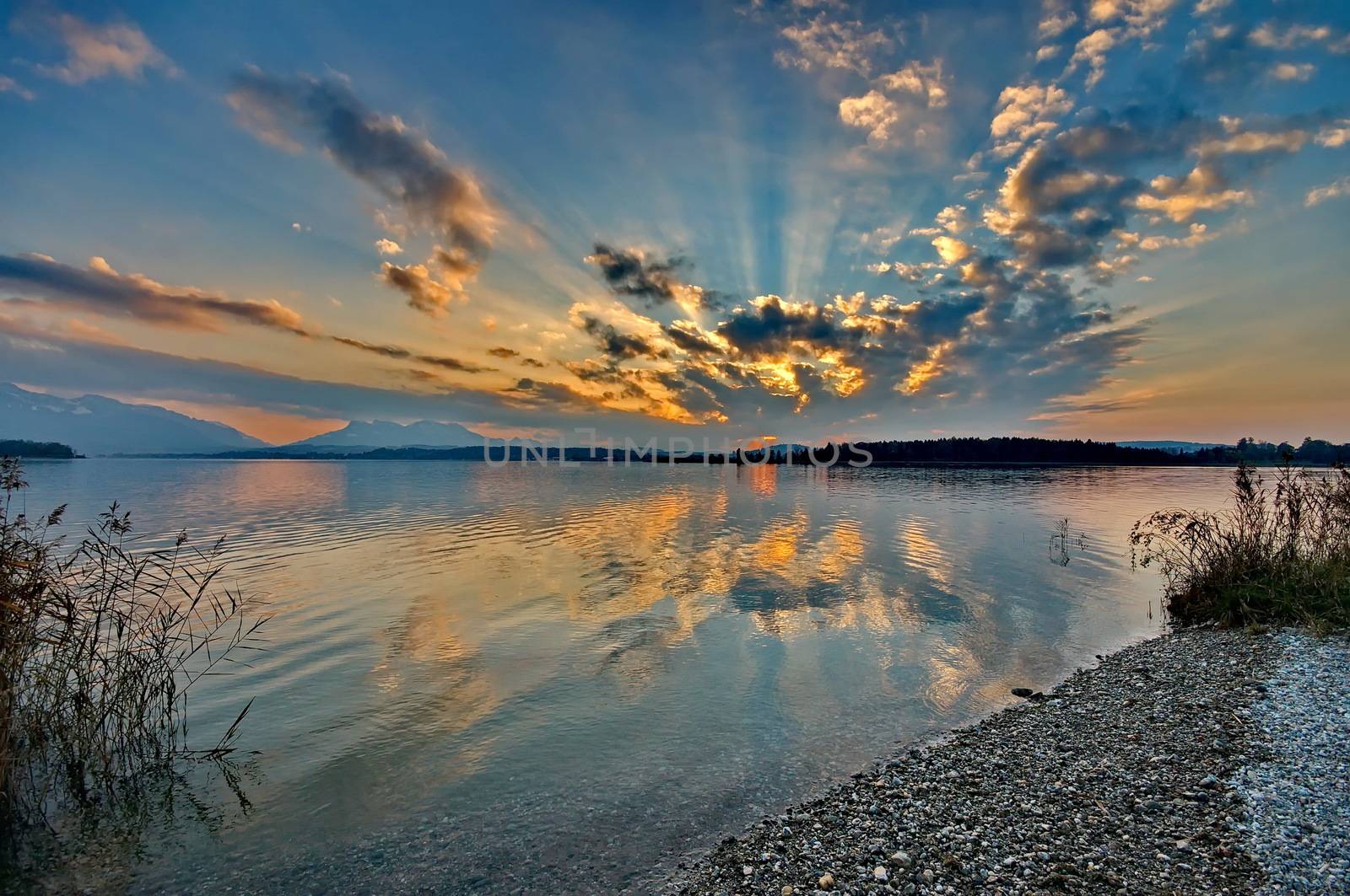 Sunset at lake Chiemsee in Germany by anderm