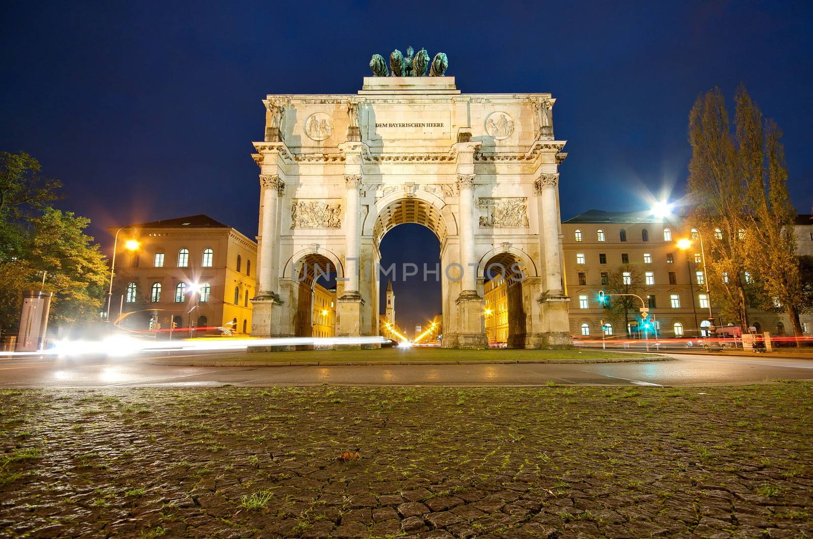 The Siegestor (Victory Gate) at night in Munich, Germany, Europe by anderm