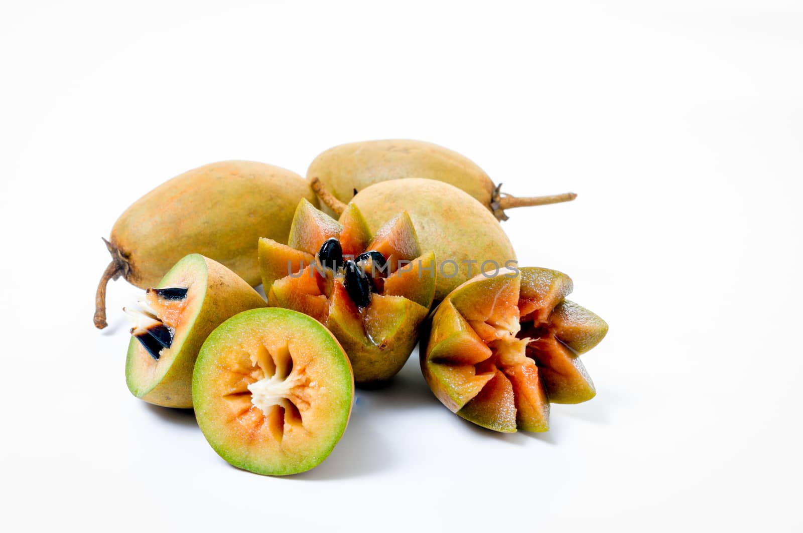 Fresh sapodillas isolated on white background