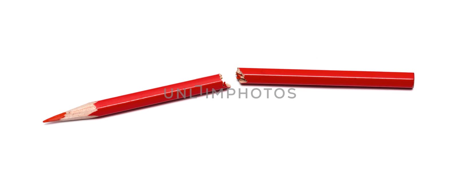 broken red pencil on a white background