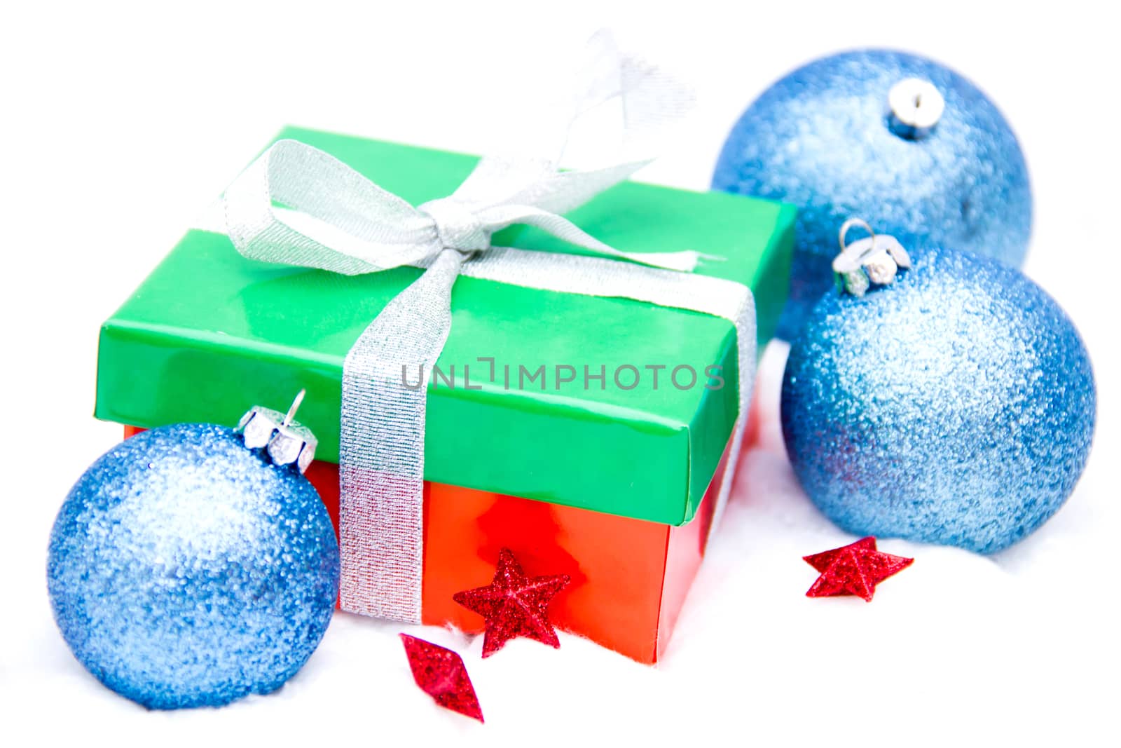 Christmas gift with decorations on white background