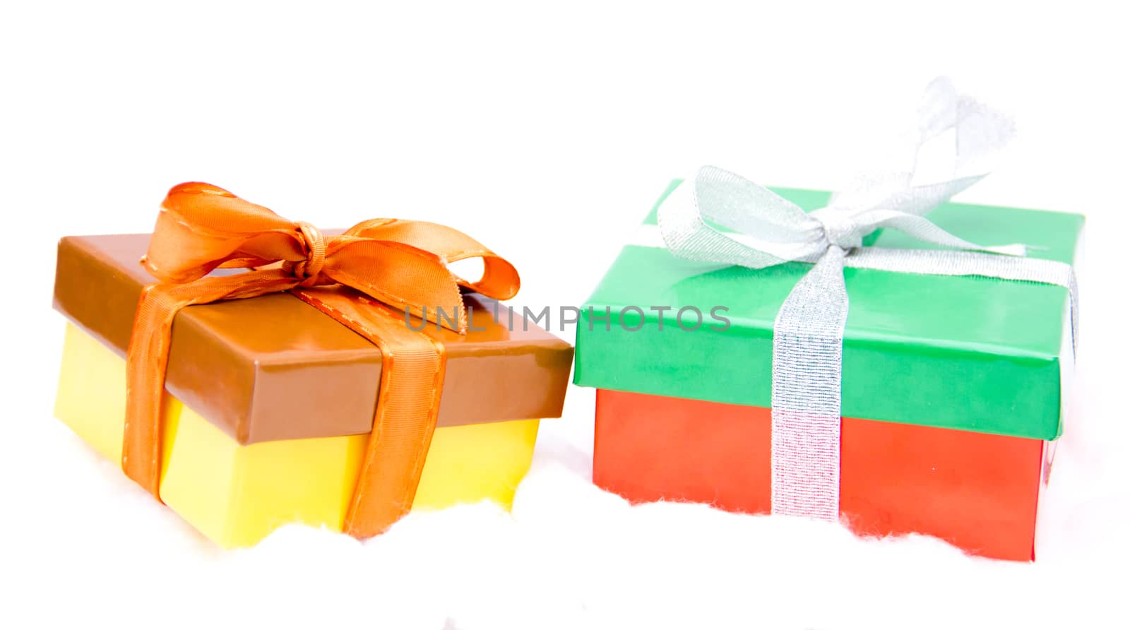 Christmas presents on white background viewed from front