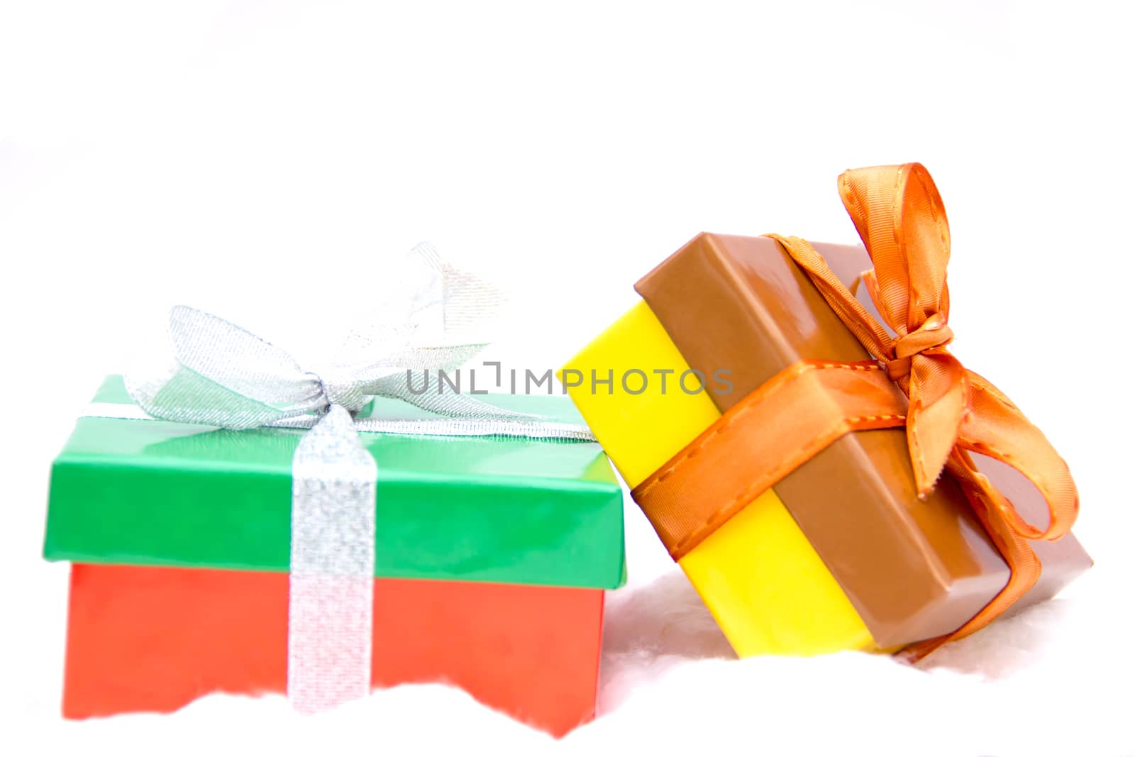 Christmas presents close up on white background