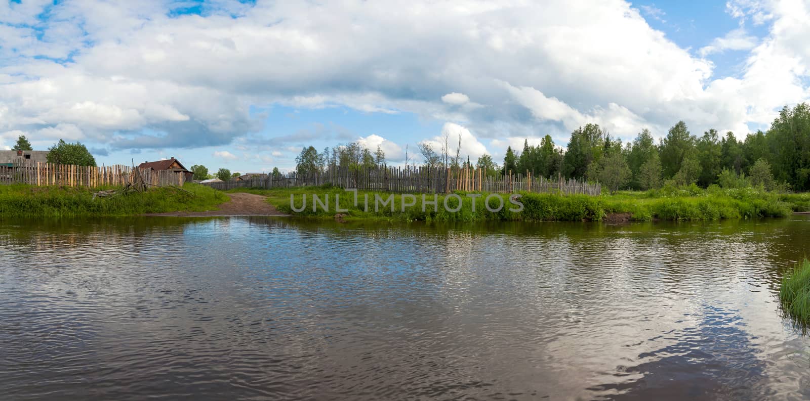 small river, cross the road to the village