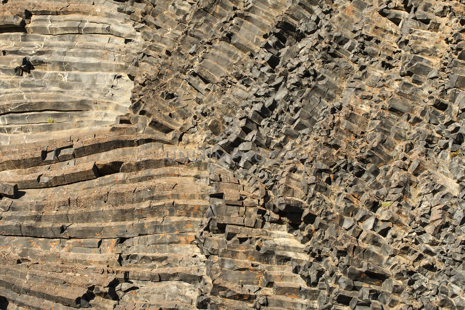 Natural background of hexagonal basalt columns in Icelandic national park Jokulsargljufur