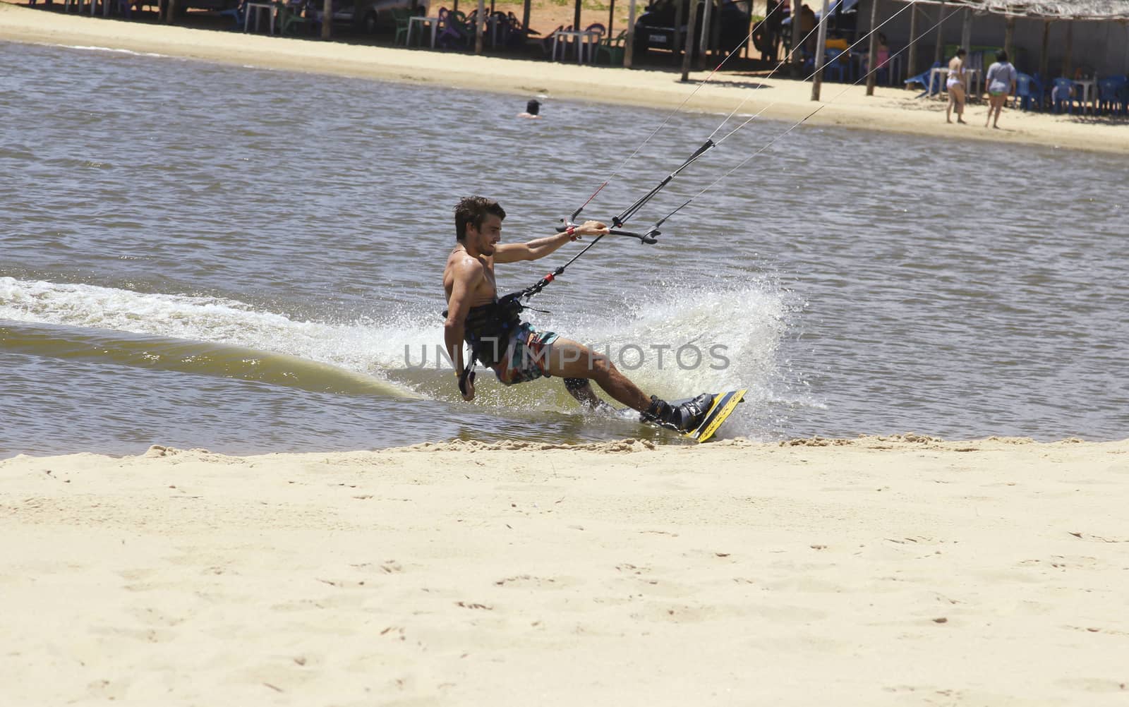 CUMBUCO BEACH, FORTALEZA/BRAZIL - DECEMBER 7: An unidentified kite surfer on Cauipe Lagoon training kite surf on December 07, 2014 in Caucaia City, Cumbuco Beach, Fortaleza State, Brazil.