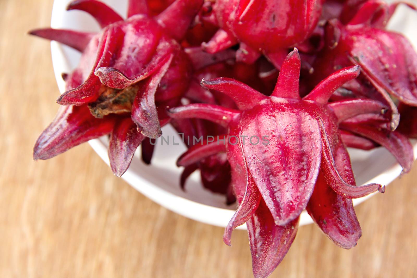 group of fresh roselle flower background.Roselle calyces are harvested fresh to produce pro-health drink.