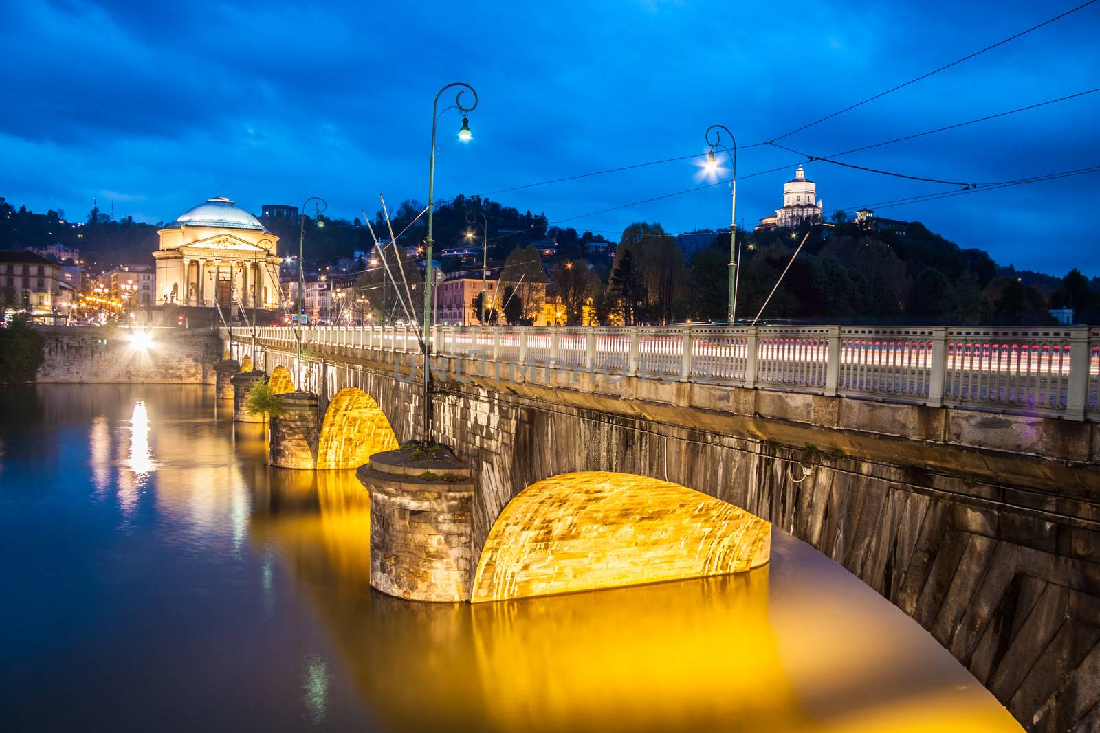 Panoramic view of bridge Vittorio Emanuele I and Chiesa della Gran Madre di Dio church in Turin, Italy, Europe. Shot in he dusk.