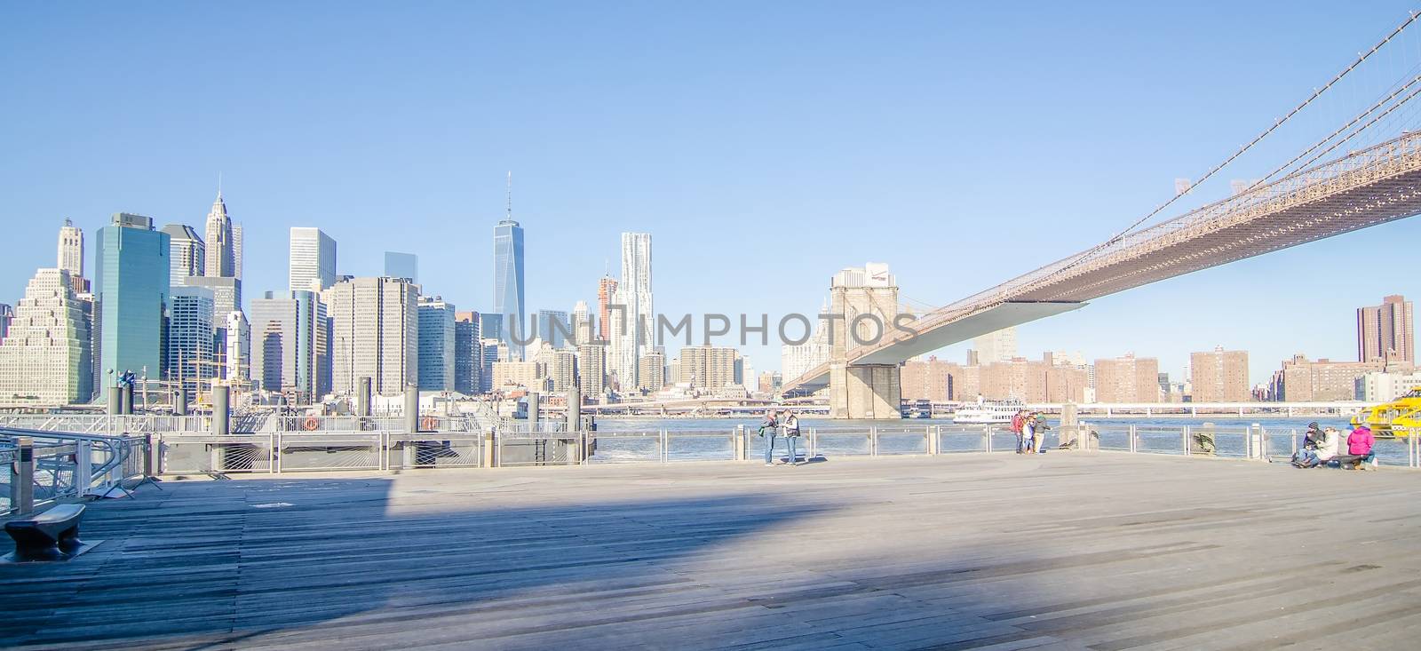 new york city manhattan bridge and skyline