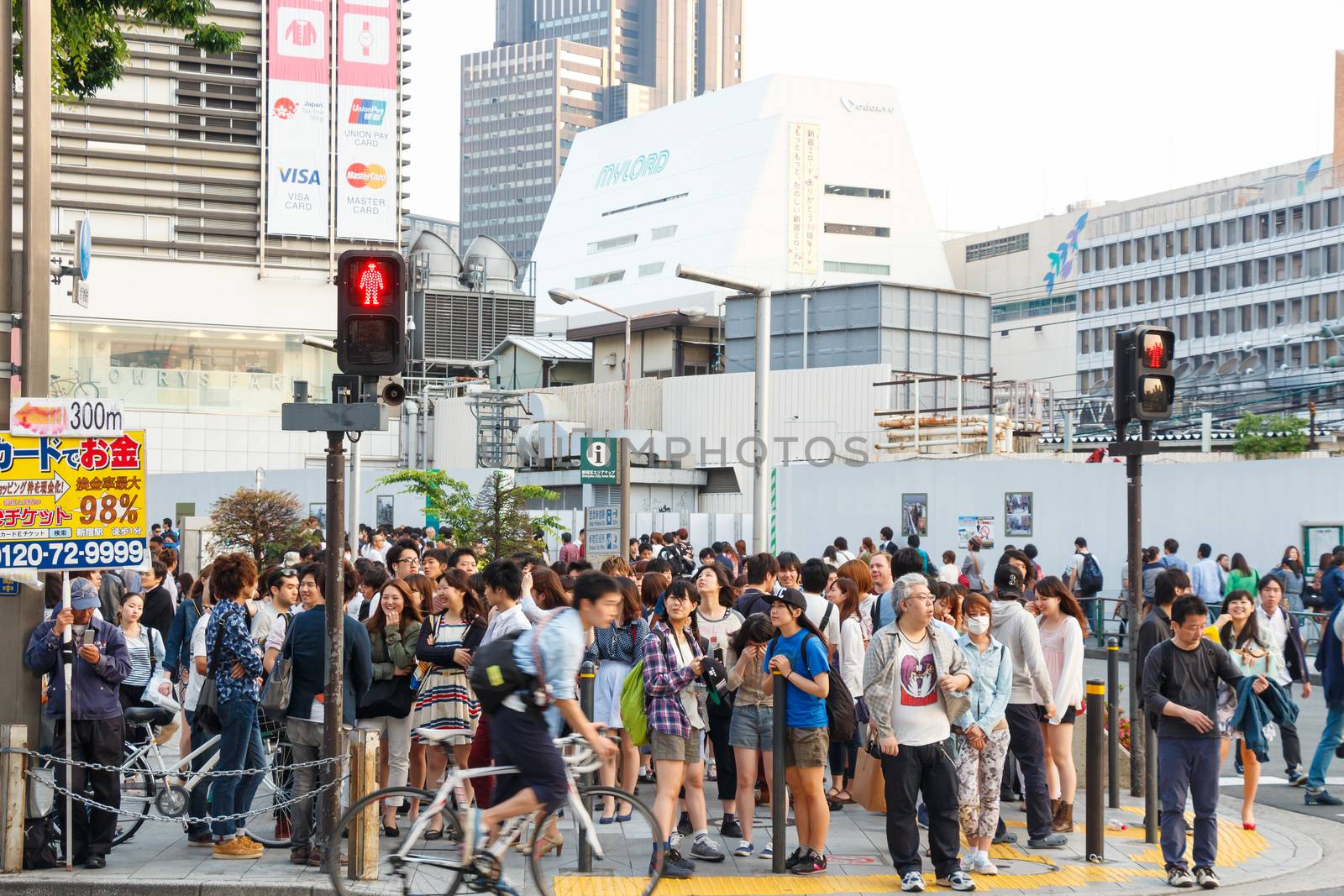 Tokyo ,Japan - May 25 ,2014. Many people cross the street by stockdevil