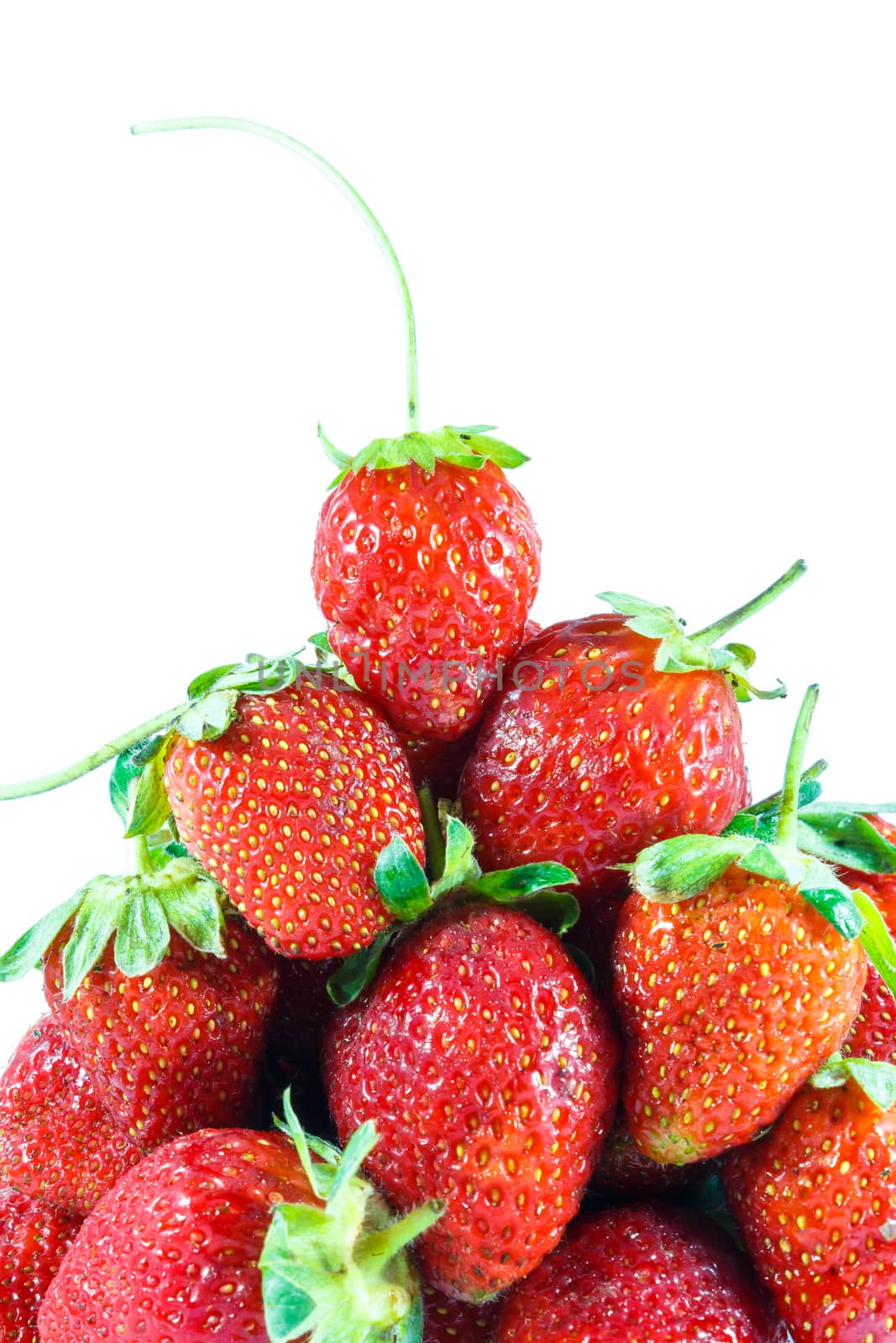 Close up of group of strawberries on white background (isolated)