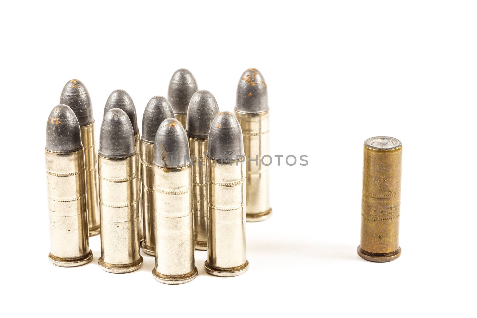 Think different (group of bullets and single bullet on white background)