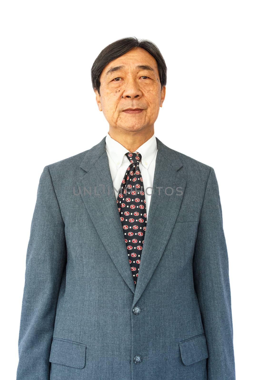 old aged thai businessman is standing and looking on white background(isolated)