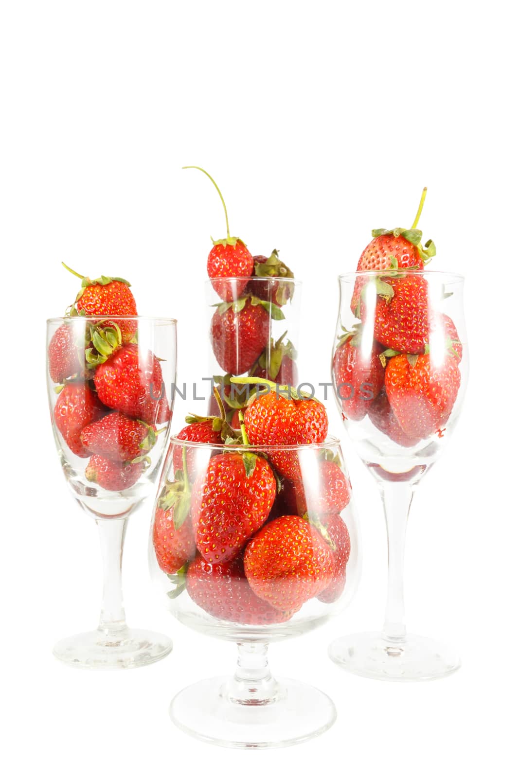 Strawberries in champagne glasses on white background (isolated)