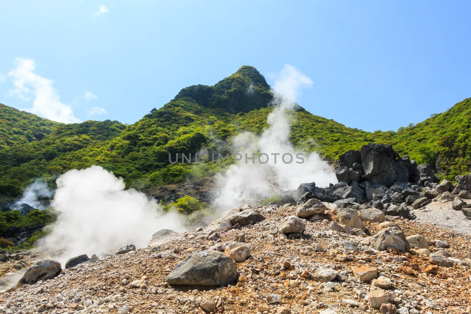 Owakudani valley ( volcanic valley with active sulphur and hot s by stockdevil