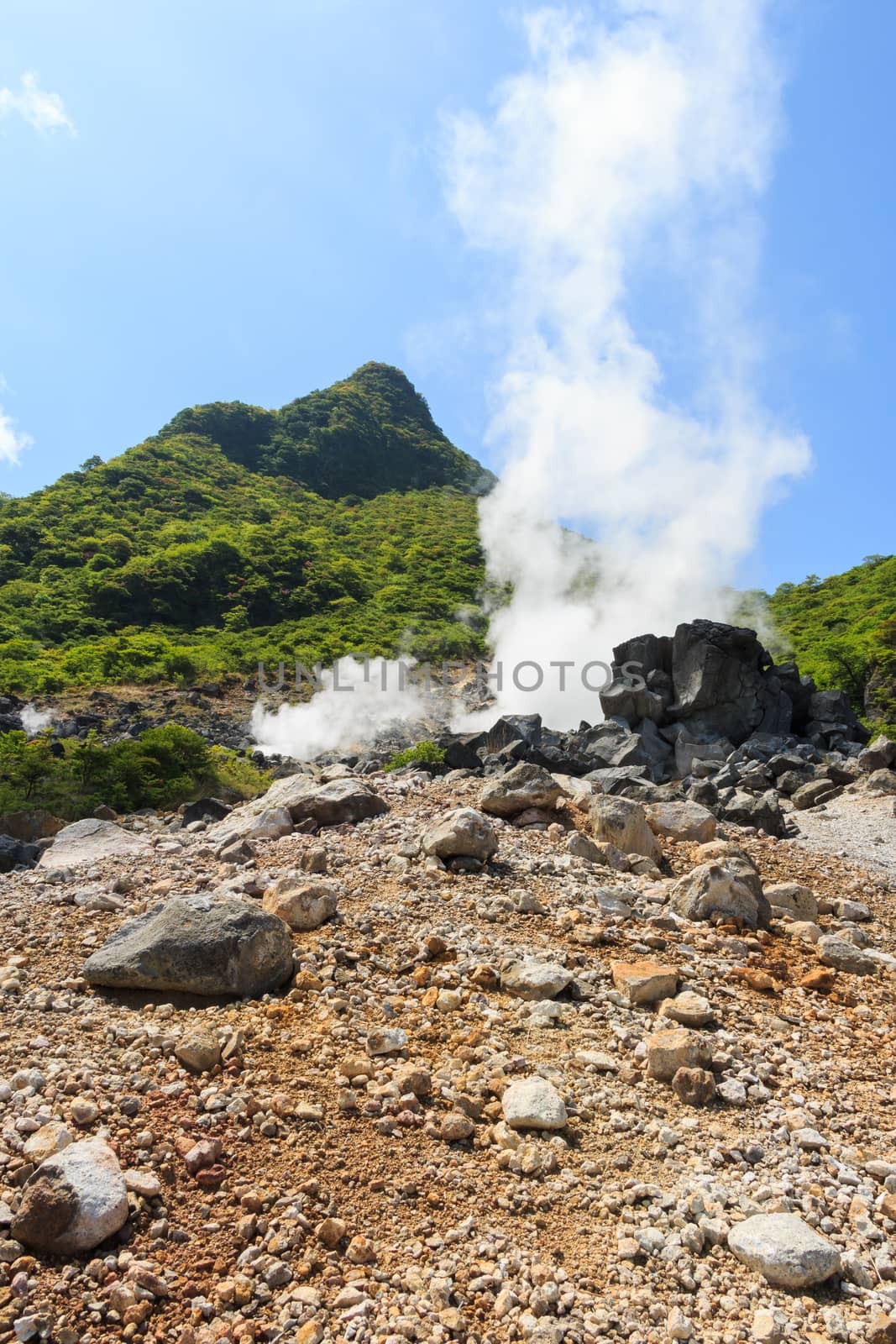 Owakudani valley ( volcanic valley with active sulphur and hot s by stockdevil